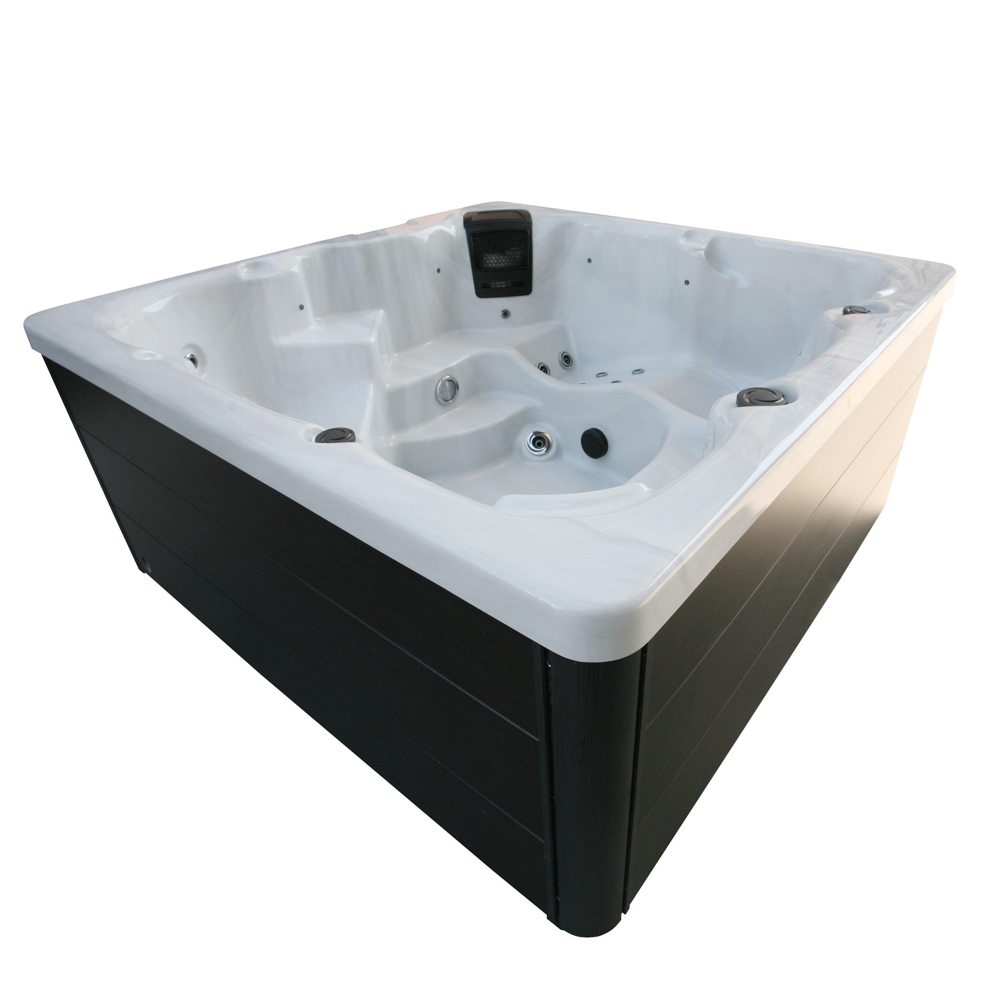 side view of acrylic hot tub, featuring jets, motors, and frames made of aluminum